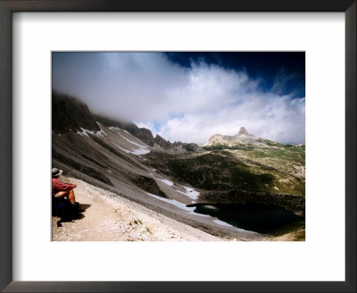 Man Looking Over Boedenknoten Ridge, Sextener Dolomites, Italy by Witold Skrypczak Pricing Limited Edition Print image