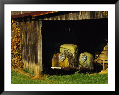 Vintage Automobile Is Parked In A Barn by Raymond Gehman Pricing Limited Edition Print image