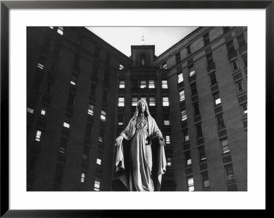 Statue Of Mary In Front Of Catholic Hospital In Chicago, Symbolizing Mother Of Mercy by John Dominis Pricing Limited Edition Print image