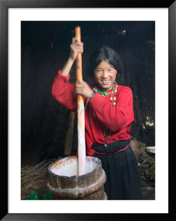 Tibetan Girl Making Butter Tea Inside The Yurt, Dingqing, Tibet, China by Keren Su Pricing Limited Edition Print image