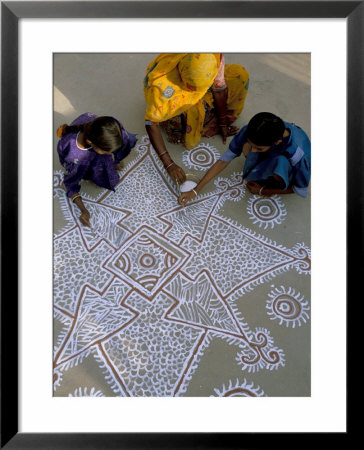 Women Painting A Mandana On The Ground, Village Near Jodhpur, Rajasthan State, India by Bruno Morandi Pricing Limited Edition Print image