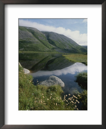 Mountains And Clouds Are Reflected In Still Waters In This Landscape by Michael S. Lewis Pricing Limited Edition Print image
