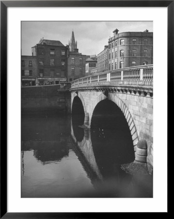 View Of The Liffey River And The Metal Bridge In Dublin by Hans Wild Pricing Limited Edition Print image