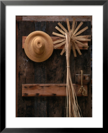 Straw Hat And Broom On Wall, Williamsburg, Usa by Rick Gerharter Pricing Limited Edition Print image