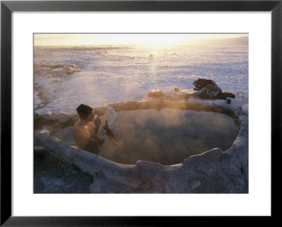 A Hiker Enjoys A Dip In A Hot Springs In Long Valley by Phil Schermeister Pricing Limited Edition Print image
