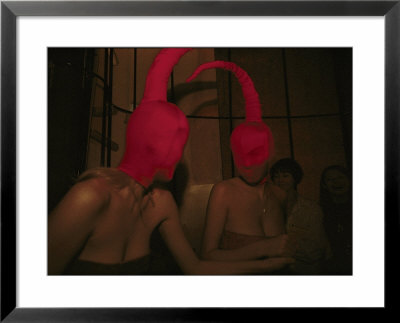 Two People Sporting Masks During Fashion Week In New York by Jodi Cobb Pricing Limited Edition Print image