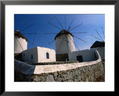 Thatched-Roof Windmills On Plateau, Mykonos Town, Greece by Wayne Walton Pricing Limited Edition Print image
