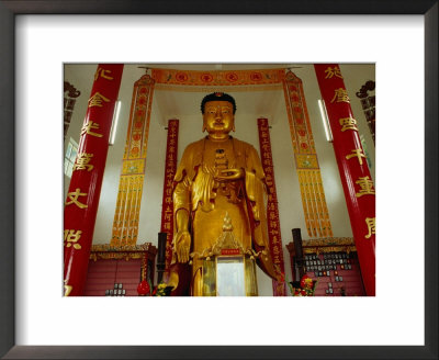 Large Golden Standing Buddha Inside Ten Thousand Buddhas Monastery, Sha Tin, Sha Tin, Hong Kong by Richard I'anson Pricing Limited Edition Print image