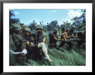 Members Of 1St Marine Division Carrying Wounded During Firefight During Vietnam War. South Vietnam by Larry Burrows Pricing Limited Edition Print image