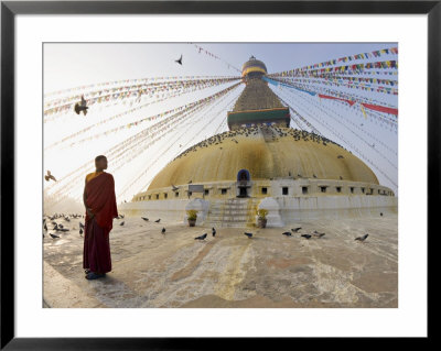 Young Buddhist Monk Turns To Look At The Dome Of Boudha Tibetan Stupa In Kathmandu, Asia by Don Smith Pricing Limited Edition Print image