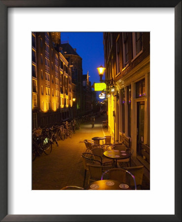 Buildings With Historic Facade And Narrow Lane At Night, Amsterdam, Netherlands by Keren Su Pricing Limited Edition Print image