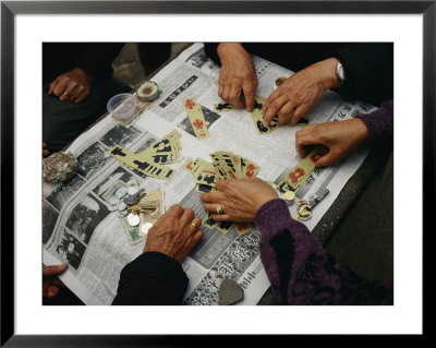 Locals Play A Chinese Card Game On A Newspaper In A Wuhan Park by Eightfish Pricing Limited Edition Print image