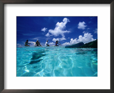 Four Women Paddling Outrigger Canoe On Lagoon At Haapiti, Moorea, The French Polynesia by Paul Kennedy Pricing Limited Edition Print image