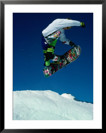 Snowboarder Jumping In Sky, Banff, Canada by Rick Rudnicki Pricing Limited Edition Print image