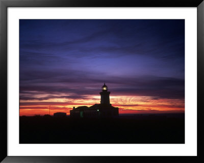 Light From Lighthouse At Night, Spain by David Marshall Pricing Limited Edition Print image