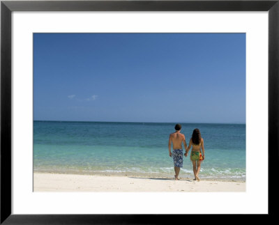 Couple Walking On Sandy Beach, Chapera Island (Contadora), Las Perlas Archipelago, Panama by Sergio Pitamitz Pricing Limited Edition Print image