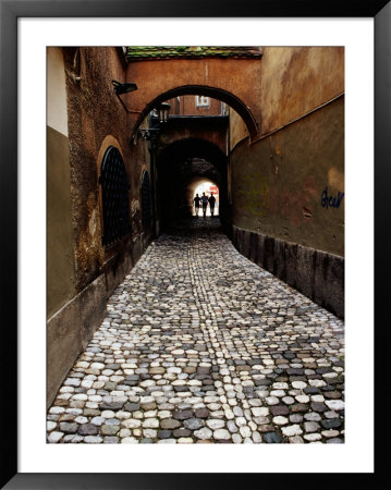 Pedestrians On Cobbled Lane Off Ribji Square, Ljubljana, Slovenia by Richard I'anson Pricing Limited Edition Print image