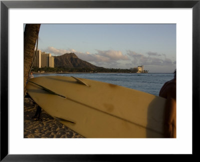 Surfer Heads To The Water In Honolulu, Waikiki Beach, Hawaii by Stacy Gold Pricing Limited Edition Print image