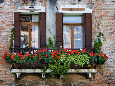 Windows And Flowers Line The Canals Of San Marco, Venice, Italy by Robert Eighmie Pricing Limited Edition Print image