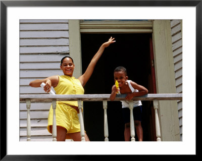Young Girl And Boy On Balcony, Galveston, U.S.A. by Oliver Strewe Pricing Limited Edition Print image