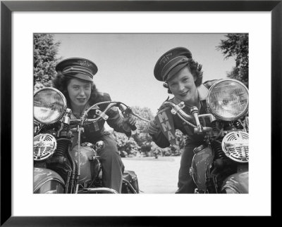 Woman And Her Daughter Sharing Interest In Motorcycle Racing by Sam Shere Pricing Limited Edition Print image