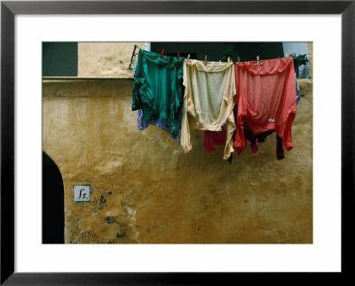 Washing Drying On The Island Of Procida In The Bay Of Naples, Procida, Campania, Italy by Jeffrey Becom Pricing Limited Edition Print image