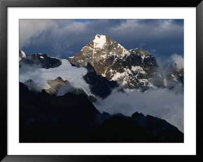 Snow-Capped Mountain Peak In Sunlight And Clouds, Peru by Richard I'anson Pricing Limited Edition Print image