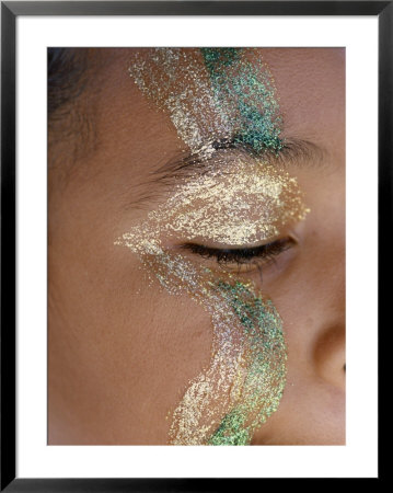 A Child Sports Glitter Face Paint During The Annual Notting Hill Carnival by Jodi Cobb Pricing Limited Edition Print image