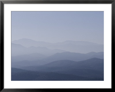 Smoke From A Forest Fire Covers The Mountainous Landscape With A Thick Haze by Marc Moritsch Pricing Limited Edition Print image