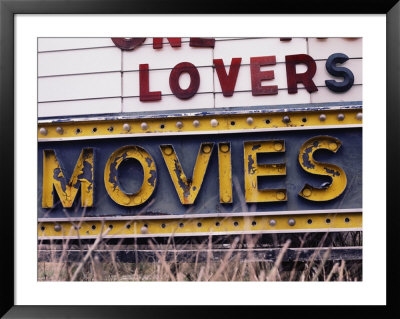 Close View Of An Old Drive-In Theater Sign by Stephen St. John Pricing Limited Edition Print image