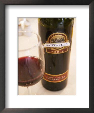 Bottle And Glass Of Santa Julia Roble Tempranillo, Restaurant In Sheraton Hotel, Mendoza, Argentina by Per Karlsson Pricing Limited Edition Print image