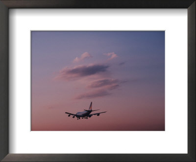 Airplane Preparing To Land Jfk International Airport At Twilight by Ira Block Pricing Limited Edition Print image