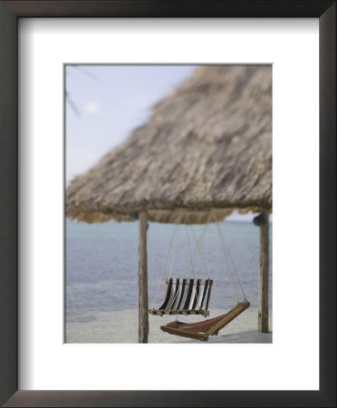 Swinging Chairs At Turneffe Caye Resort, Belize by Stuart Westmoreland Pricing Limited Edition Print image