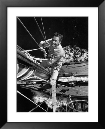 Portrait Of Actor Erroll Flynn Aboard His Yacht Sirocco by Peter Stackpole Pricing Limited Edition Print image