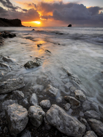 Sunrise In Man O War Cove, Jurassic Coast, Dorset, England by Adam Burton Pricing Limited Edition Print image