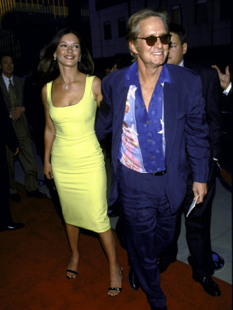 Actors Catherine Zeta-Jones And Michael Douglas, Wearing Sunglasses by Mirek Towski Pricing Limited Edition Print image