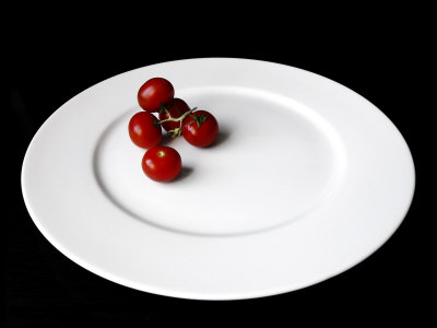 Still Life With Five Tomatoes On White Oval Plate by Ilona Wellmann Pricing Limited Edition Print image