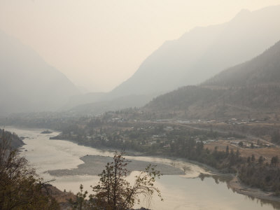 Town Of Lillooet On A Summer Forest Fire Smoky Day by Taylor S. Kennedy Pricing Limited Edition Print image