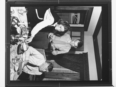 Jimmy Stewart And Virginia Tiranoff Clearing The Table For Dinner, Upon Stewart's Return From Wwii by Peter Stackpole Pricing Limited Edition Print image
