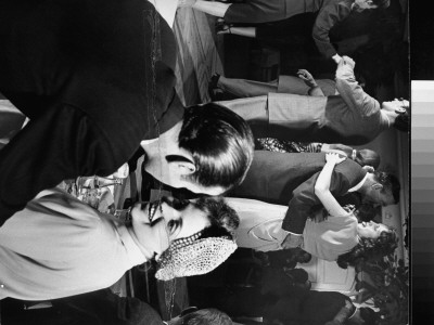 Ex-Goldwyn Girl Kizmi Stefan Talking While Couples Dance In Background At Havana-Madrid Nightclub by Gjon Mili Pricing Limited Edition Print image