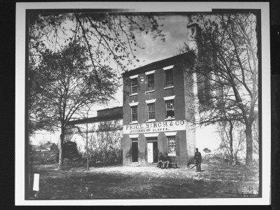 Exterior Of Brick Building Where Price, Birch And Co. Operated Slave-Trading House From 1858-1861 by Andrew Joseph Russell Pricing Limited Edition Print image