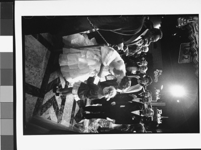 Elizabeth Taylor Signing An Autograph For A Little Girl On Her Way Into The 25Th Academy Awards by Loomis Dean Pricing Limited Edition Print image