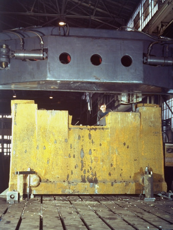 Man Working On Drop-Forging Hammer Which Is Being Built At The Chambersburg Engineering Co by Dmitri Kessel Pricing Limited Edition Print image