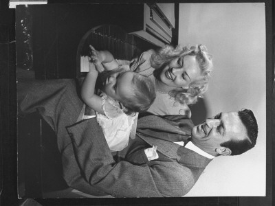 Actress Betty Grable Sitting At Piano With Her Bandleader Husband Harry James by Peter Stackpole Pricing Limited Edition Print image