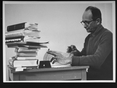 Nazi War Criminal Adolf Eichmann Working At Table In His Cell At Djalameh Jail by Gjon Mili Pricing Limited Edition Print image