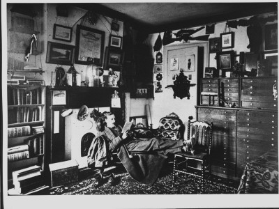 Self-Portrait Of Pipe-Smoking Photographer Wallace G. Levison, Reading A Book by Wallace G. Levison Pricing Limited Edition Print image