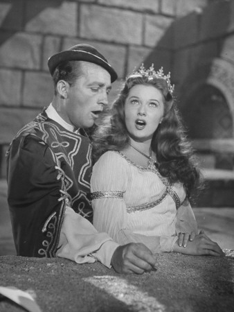 Rhonda Fleming And Bing Crosby Singing In Connecticut Yankee by Allan Grant Pricing Limited Edition Print image