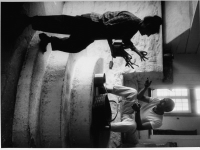 Dancer Jose Limon In Kitchen Of His Home With Wife Pauline Lawrence by Gjon Mili Pricing Limited Edition Print image