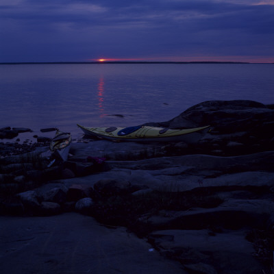 Two Kayaks On A Seaside, Sunset by Bjorn Wiklander Pricing Limited Edition Print image