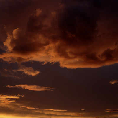 Low Angle View Of Clouds In The Sky At Sunset, Iceland by Bragi Thor Josefson Pricing Limited Edition Print image